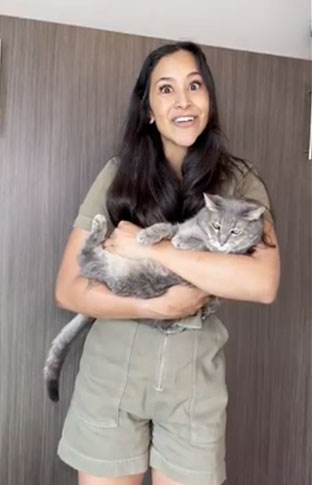 Customer holding their pet next to a Colorfil air filter